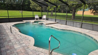 pool with built in jacuzzi