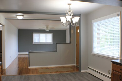 Upstairs dining area view to living room