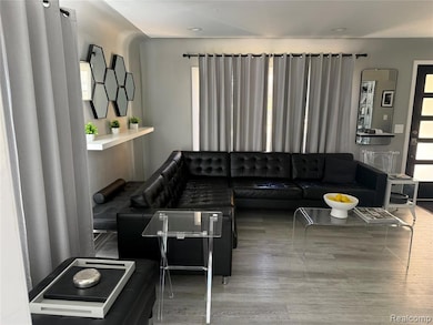 Living room featuring wood finished floors
