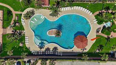The resort-style pool offers a tropical oasis with