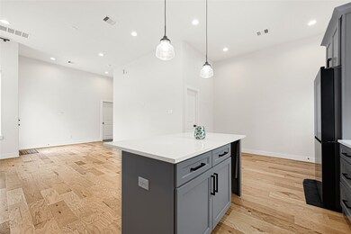 Open-concept dining area seamlessly connected to t