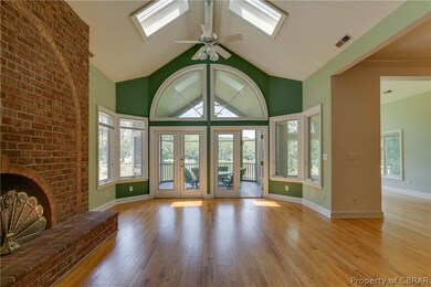 Cathedral ceiling Living Room with skylights - ope