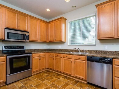 9634 Simeon Dr, Land O Lakes, FL 34638 - photo 5