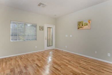 Living Room with Beveled Glass Entry Door and oak