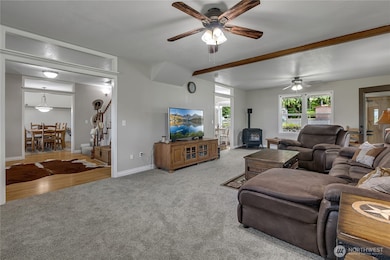 Get cozy! New carpet and fresh pain invite you to sit and stay awhile.