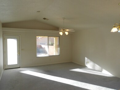 Living Room w/ Vaulted Ceiling