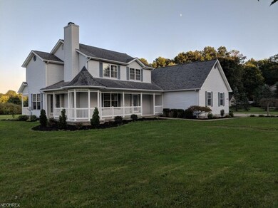 Lovely wrap around porch , country setting