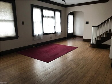 Hardwood floors and woodwork throughout home.