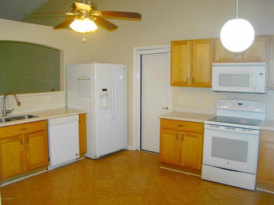 LOTS OF CABINETS & TILE!