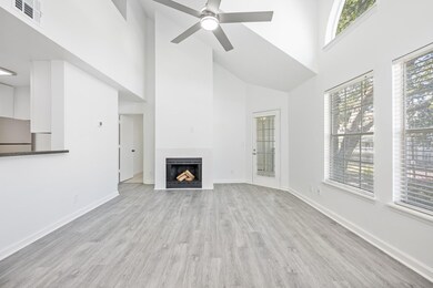 A modern electric fireplace adds warmth and character to the Living area.