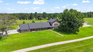 View from above of property with a forest