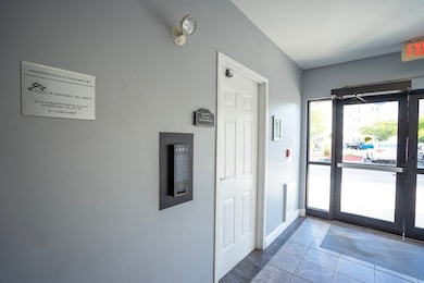 Spicket Commons unit 404, Methuen, MA 01844 - photo 5