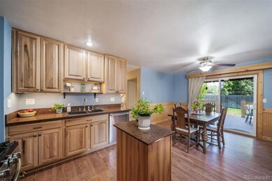 Recently remodeled kitchen is open to the dining room and the covered deck.