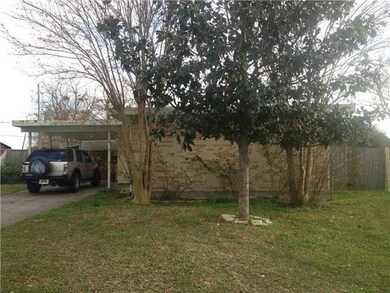 Photo. Different view of front exterior shows  dri
