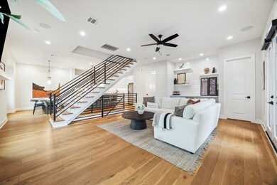 A gorgeour living area is separated from the gourm