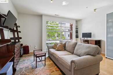 Living area featuring an office area and light wood finished floors