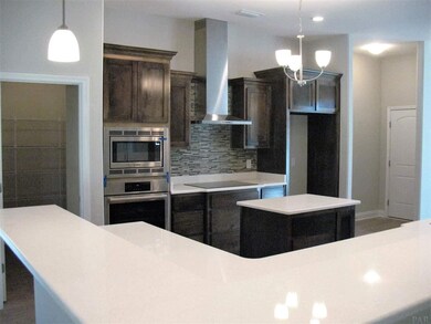 Miles of counter space, tile back splash & more!