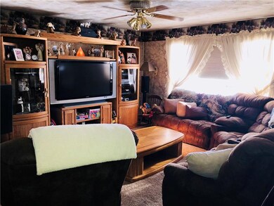 Nice size living room with a large window allowing