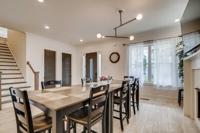 UNIT B. Stairs to upstairs off of Dining room.