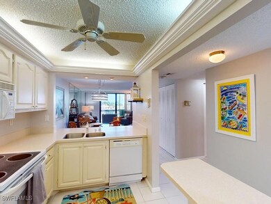 Kitchen featuring light tile patterned floors, whi