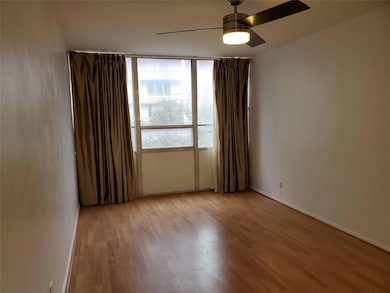 Spare room with light wood finished floors, ceili