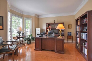 Front office or living room with bay window measures 14 x 14.