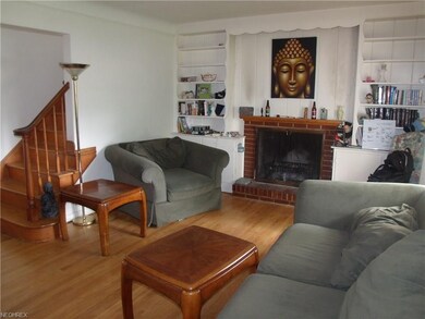 Ample living room with its shiny hardwood floor, w
