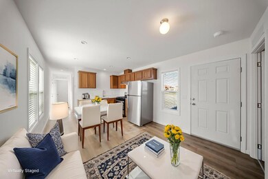 Please note that the image shown is a virtually staged representation of the room and is intended to provide a visual concept of the space. The actual room may differ in appearance, and the furniture and decor depicted are not included in the sale. For an accurate understanding of the property's current condition and layout, we encourage you to view the home in person. Thank you