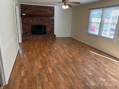 Another view of the fireplace with gas logs 