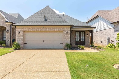 View of front of house featuring a garage and a fr