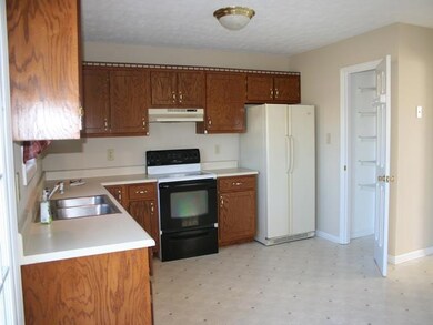 Abundant oak cabinets and counter space.Pantry, with stove, refrigerator,dishwasher.