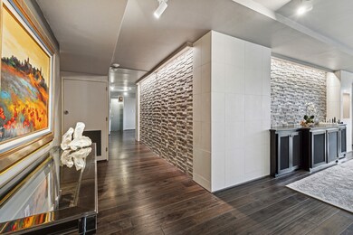 View toward entry from living, dining & kitchen ar
