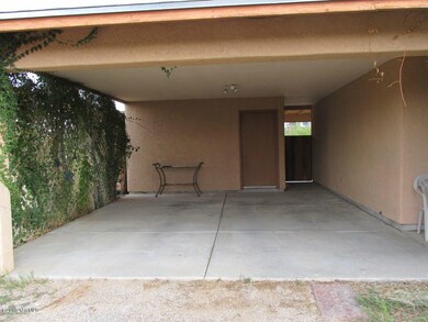 Two Car Carport and Storage Room