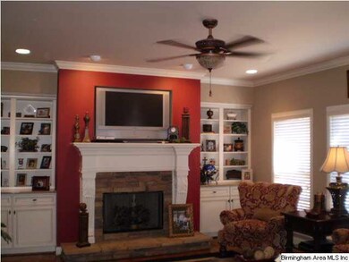 OPEN GREATROOM, BOOK SHELVES AT FIREPLACE