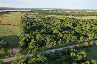 View of property location with a nearby body of water