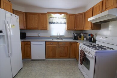 Spacious kitchen equipped with dishwasher, gas sto