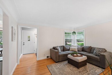 Additional view of family room, enjoy gorgeous wood floors and newer windows.  Front door also replaced.