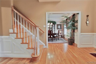 Interior entry hall looking into formal dining room.