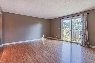 Unfurnished room featuring a wealth of natural lig
