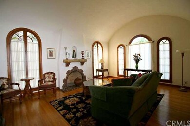 Barrel ceiling in living room makes this room feel