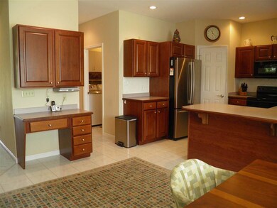Planning desk, lots of beautiful cabinetry, breakf