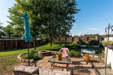 ENJOY THE OUTDOORS IN FENCED IN BACK YARD!