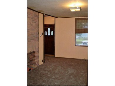 Living Room. Brand new carpet in living room