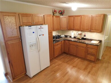 Wood cabinets and new counters, Side by side refri