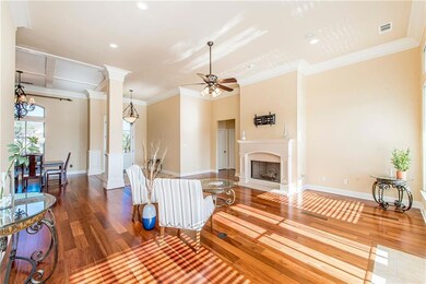 Living room has cozy fireplace