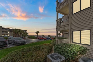 Yard at dusk with central AC and a balcony
