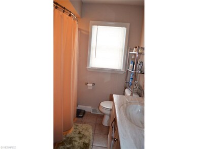 Renovated full bathroom is on the first level