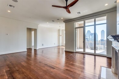 Spare room featuring ornamental molding, wood-type