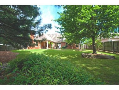 Professionally Landscaped Fenced Back Yard with A 