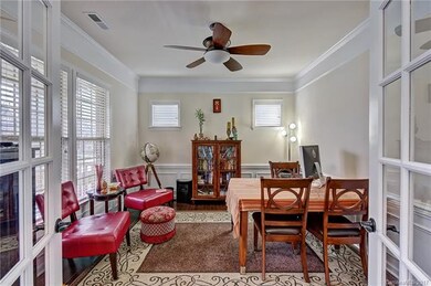 Office with french doors and gorgeous hardwood flo